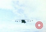 Image of US Army doctors treating leg Vietnam, 1967, second 59 stock footage video 65675080307