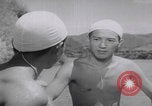 Standbild Japanische Jungen schwimmen Japan, 1937, aus Sekunde 14 historischem Filmmaterial Videoclip 65675080322