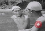 Standbild Japanische Jungen schwimmen Japan, 1937, aus Sekunde 20 historischem Filmmaterial Videoclip 65675080322