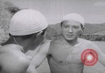 Standbild Japanische Jungen schwimmen Japan, 1937, aus Sekunde 23 historischem Filmmaterial Videoclip 65675080322