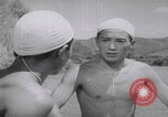 Standbild Japanische Jungen schwimmen Japan, 1937, aus Sekunde 31 historischem Filmmaterial Videoclip 65675080322