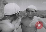 Standbild Japanische Jungen schwimmen Japan, 1937, aus Sekunde 34 historischem Filmmaterial Videoclip 65675080322