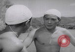 Standbild Japanische Jungen schwimmen Japan, 1937, aus Sekunde 37 historischem Filmmaterial Videoclip 65675080322
