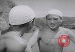 Standbild Japanische Jungen schwimmen Japan, 1937, aus Sekunde 57 historischem Filmmaterial Videoclip 65675080322