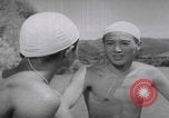 Standbild Japanische Jungen schwimmen Japan, 1937, aus Sekunde 58 historischem Filmmaterial Videoclip 65675080322