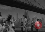 Image of children playing under Brooklyn Bridge New York City USA, 1944, second 4 stock footage video 65675080373