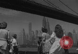 Image of children playing under Brooklyn Bridge New York City USA, 1944, second 5 stock footage video 65675080373