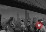Image of children playing under Brooklyn Bridge New York City USA, 1944, second 8 stock footage video 65675080373