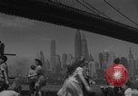 Image of children playing under Brooklyn Bridge New York City USA, 1944, second 9 stock footage video 65675080373