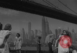 Image of children playing under Brooklyn Bridge New York City USA, 1944, second 10 stock footage video 65675080373