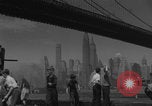 Image of children playing under Brooklyn Bridge New York City USA, 1944, second 17 stock footage video 65675080373