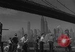 Image of children playing under Brooklyn Bridge New York City USA, 1944, second 20 stock footage video 65675080373