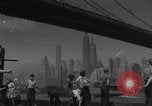 Image of children playing under Brooklyn Bridge New York City USA, 1944, second 23 stock footage video 65675080373