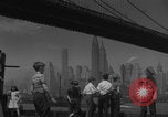 Image of children playing under Brooklyn Bridge New York City USA, 1944, second 25 stock footage video 65675080373