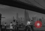 Image of children playing under Brooklyn Bridge New York City USA, 1944, second 29 stock footage video 65675080373