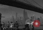 Image of children playing under Brooklyn Bridge New York City USA, 1944, second 34 stock footage video 65675080373