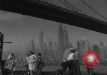 Image of children playing under Brooklyn Bridge New York City USA, 1944, second 35 stock footage video 65675080373
