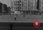 Image of boys playing baseball New York City USA, 1944, second 3 stock footage video 65675080380