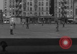 Image of boys playing baseball New York City USA, 1944, second 4 stock footage video 65675080380