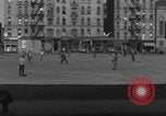 Image of boys playing baseball New York City USA, 1944, second 5 stock footage video 65675080380