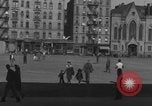 Image of boys playing baseball New York City USA, 1944, second 15 stock footage video 65675080380