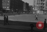 Image of boys playing baseball New York City USA, 1944, second 20 stock footage video 65675080380