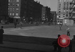 Image of boys playing baseball New York City USA, 1944, second 22 stock footage video 65675080380