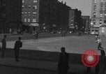 Image of boys playing baseball New York City USA, 1944, second 23 stock footage video 65675080380