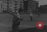 Image of boys playing baseball New York City USA, 1944, second 27 stock footage video 65675080380