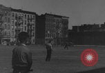 Image of boys playing baseball New York City USA, 1944, second 31 stock footage video 65675080380