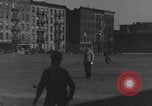 Image of boys playing baseball New York City USA, 1944, second 35 stock footage video 65675080380