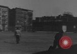 Image of boys playing baseball New York City USA, 1944, second 36 stock footage video 65675080380