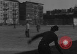 Image of boys playing baseball New York City USA, 1944, second 41 stock footage video 65675080380