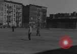 Image of boys playing baseball New York City USA, 1944, second 46 stock footage video 65675080380