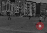 Image of boys playing baseball New York City USA, 1944, second 47 stock footage video 65675080380