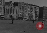 Image of boys playing baseball New York City USA, 1944, second 49 stock footage video 65675080380