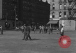 Image of boys playing baseball New York City USA, 1944, second 51 stock footage video 65675080380