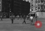 Image of boys playing baseball New York City USA, 1944, second 52 stock footage video 65675080380
