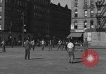 Image of boys playing baseball New York City USA, 1944, second 53 stock footage video 65675080380