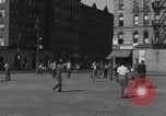 Image of boys playing baseball New York City USA, 1944, second 55 stock footage video 65675080380