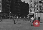 Image of boys playing baseball New York City USA, 1944, second 56 stock footage video 65675080380