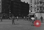 Image of boys playing baseball New York City USA, 1944, second 57 stock footage video 65675080380