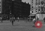 Image of boys playing baseball New York City USA, 1944, second 58 stock footage video 65675080380