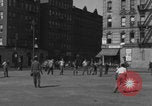 Image of boys playing baseball New York City USA, 1944, second 59 stock footage video 65675080380