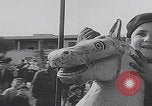 Image of children ride carousel Italy, 1950, second 6 stock footage video 65675080391