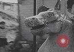 Image of children ride carousel Italy, 1950, second 9 stock footage video 65675080391