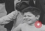 Image of children ride carousel Italy, 1950, second 10 stock footage video 65675080391