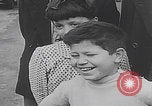 Image of children ride carousel Italy, 1950, second 11 stock footage video 65675080391