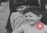 Image of children ride carousel Italy, 1950, second 13 stock footage video 65675080391