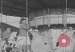 Image of children ride carousel Italy, 1950, second 17 stock footage video 65675080391